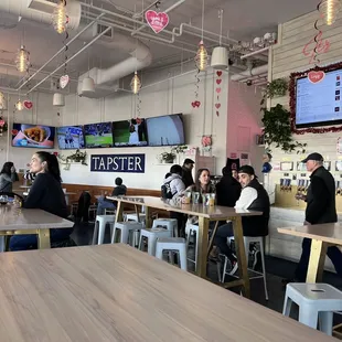 Taps on the right wall, the communal tables encourage a friendly time.