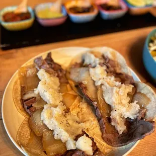 Bistec tacos (topped with potato and grilled onions-optional)