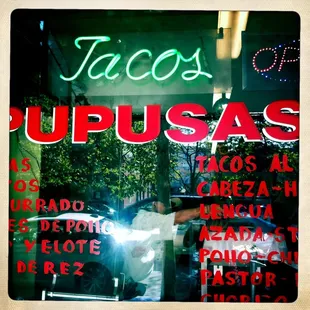 reflection of a man in the window