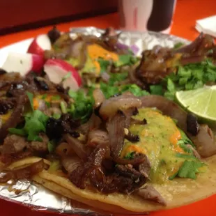 Lengua with both sauces! Added the grilled onions on top!