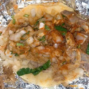 a taqueria wrapped in foil