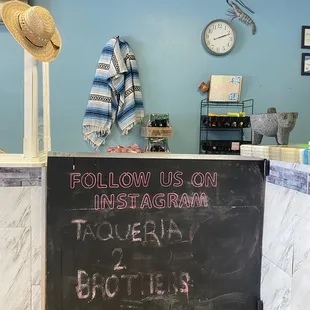 a blackboard with the words follow us on instagram