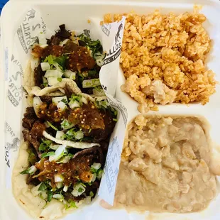 Carnitas Asada tacos plate with rice and beans