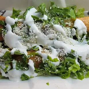 Chicken taquitos (dorados). The topping/cheese is sooooo good.