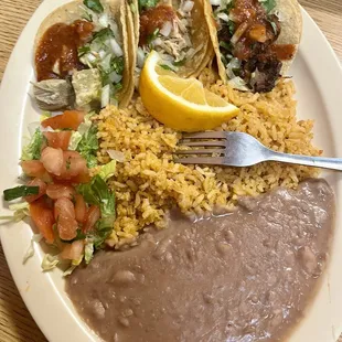 Three Taco Special (I chose pollo, chili verde, al pastor) and asked for no cheese on the beans