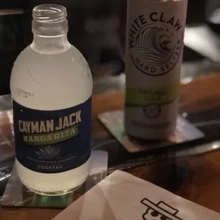 a glass of water and a bottle of water