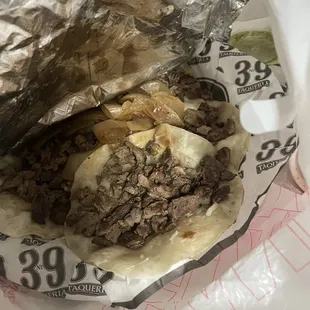 a sandwich wrapped in foil