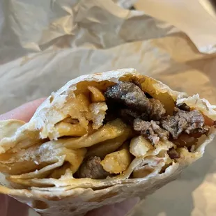 Inside the California Burrito - filled with carne asada, potatoes, cheese and pico de gallo