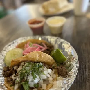 Classic taco and steak and guac taco