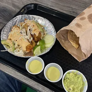 Fish Tacos and chips with guacamole