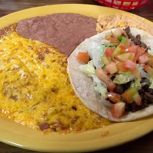 Mexican plate. Enchiladas and beef fajita taco