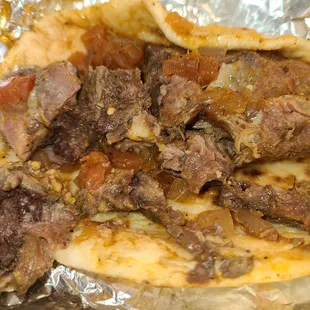 Lengua Guisada spicy, tender so good .