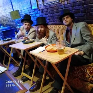 The Esquires enjoying the best console tv dinner. No foil