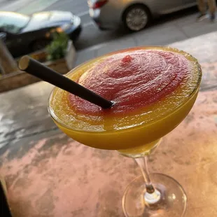 Passionfruit and strawberry margarita. Yum!!
