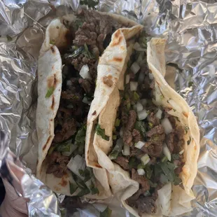 Close up. Fajita tacos on flour tortillas