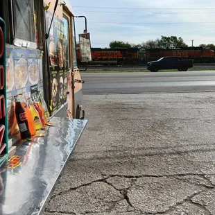 a taqueria truck parked on the side of the road
