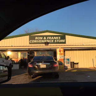 The food truck sits in the parking lot of this store.
