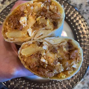 Chorizo, egg, potato, and cheese burrito, added beans. Amazing.