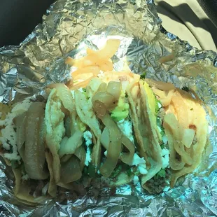 a sandwich wrapped in foil