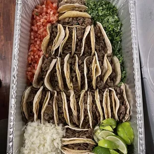 Allstate tacos, flour, and corn tortillas made into a Christmas tree.