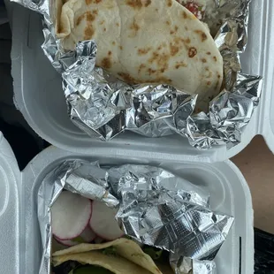 Disappointing $8 chicken quesadilla on top. Tacos on bottom.