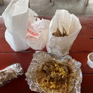 a plate of food on a picnic table