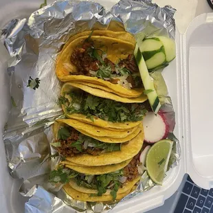 Chorizo tacos and Al Pastor tacos