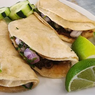 Three barbacoa tacos! Excellent!
