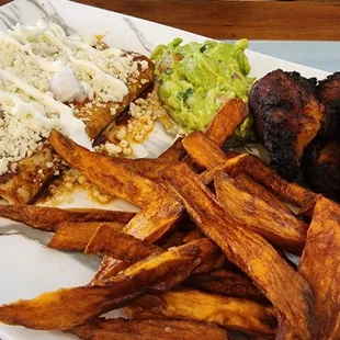 Barbacoa enchiladas with sweet potato fries and fried plantains.