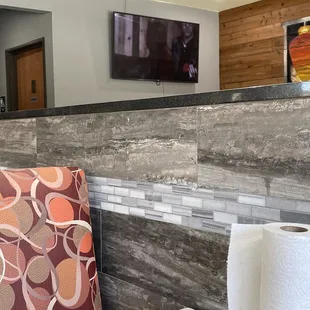 Booths and tables available for self seating. Music Tv