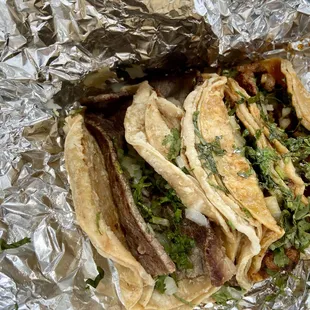 4 tacos - 2 pastor, 2 cecina