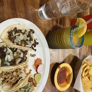 4 tacos, water, and frozen mango margarita, chips and salsa!!