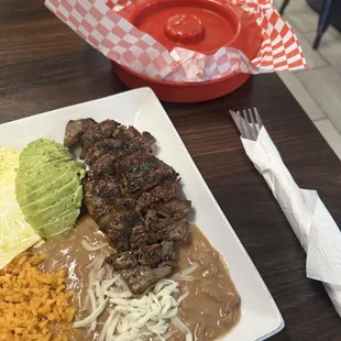 Steak and Eggs (huevos con carne) comes with tortillas