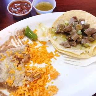 Lengua tacos with rice and beans.