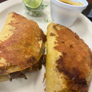 Quesabirria tacos with consumé