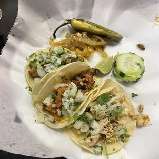 Al pastor, carnitas and chicken tacos