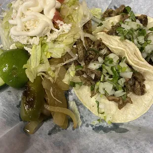 A Sope and Carne Asada tacos