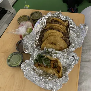 Al Pastor and Carne Asada Tacos with Salsas, Limes and Radish, yummy
