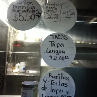 Menu on paper plates. This place is legit!