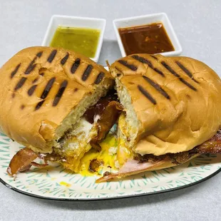 a half eaten sandwich on a plate