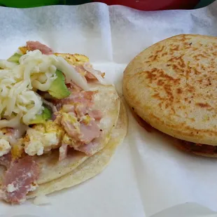 Egg, ham, cheese &amp; avocado taco on corn and a gordita al pastor.