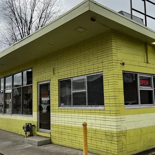 a taqueria located on the corner of a street