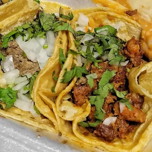 a taco with meat and onions