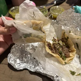 Tacos Taco de Barbacoa why are the tacos packed this way?!! They are soggy and the tortillas are just not cooked right.