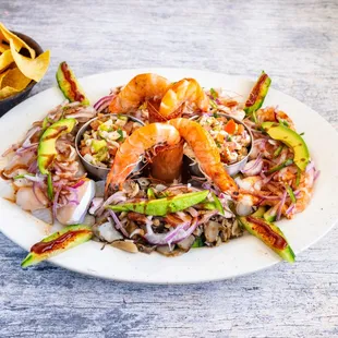 a plate of shrimp and vegetables