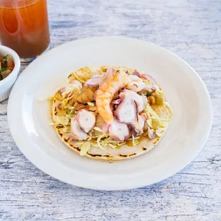 a plate of food and a drink