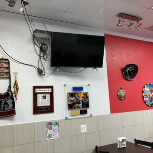 a television mounted on the wall