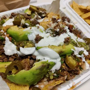 Super nachos with Carne asada