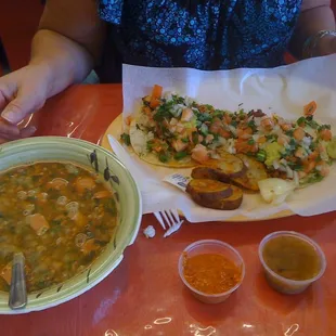 charros (beans) shown in the soup bowl