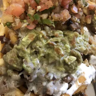 Extra crispy nacho fries w/ old guacamole